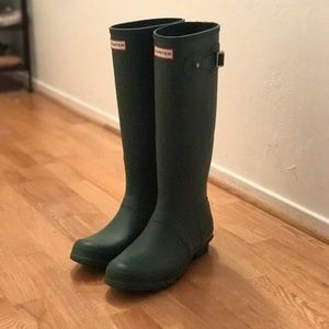 Tall matte green Hunter rain boots